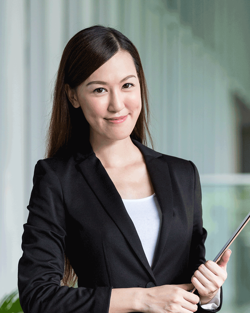 A woman in a black suit holding a tablet.