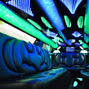 The luxury blue and green interior of a stylish Dodge Charger Limo in Nashville, Tennessee