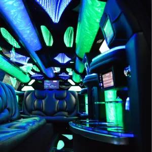 The vibrant green and blue luxurious interior design of Dodge Charger Limousine