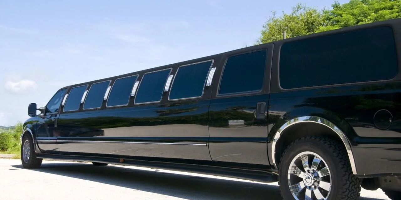 A black stretch limo parked outside