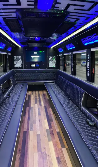 Jet black interior of a 31 passenger party bus