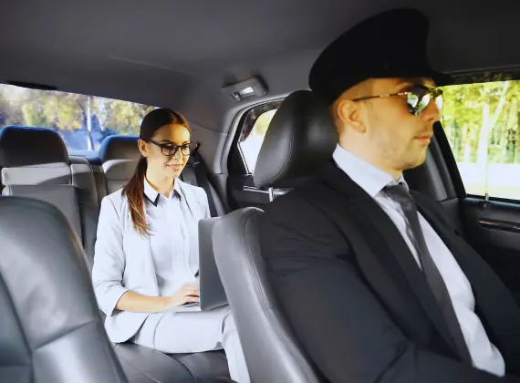 A girl sitting in a corporate sedan in Tennessee